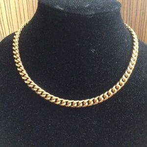 Large link gold tone necklace. Approximately 17 inches long.